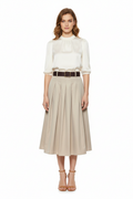 Beige pleated skirt on model
