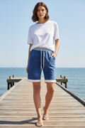 Blue Shorts on Model at Pier